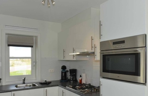 Zuideinde Apartamento | Rietburghaus N5 02, water and nature park, at least 7 days - Rietburghaus