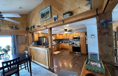 Laurium Casa | Right off the main trail system! Heated garage large parking for large trailers