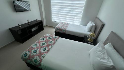 Leticia Casa | Rio-ApartaHotel-Lagos