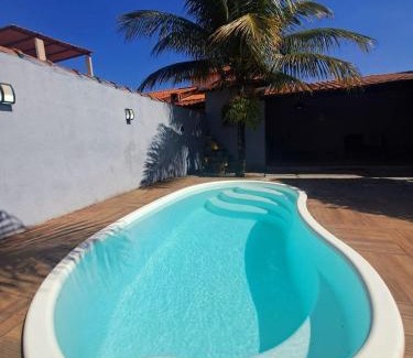 Itaipuacu Apartamento | RiqueHouse: Piscina, churrasqueira a 500m da praia