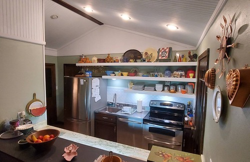 Cherokee Village Casa | RIR: E Faye Jones style Rock floor to ceiling in 3 bathrooms open floor plan.