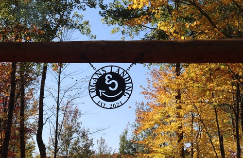Crystal Falls Cabina | RIVER RENTAL NEW LOG CABIN-POOL SPA ON THE PAINT RIVER-DOCK-CANOES FISH GOLF ORV