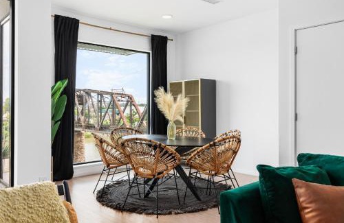 North Capitol Casa | River View High-End Condo with Private Patio and FREE Parking