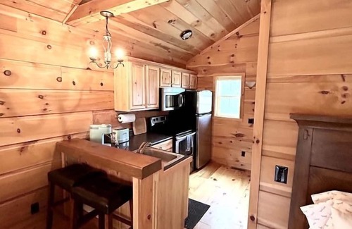 Meadows Of Dan Cabina | River Walk Cabins: Flower Cabin