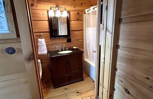 Meadows Of Dan Cabina | River Walk Cabins: Flower Cabin