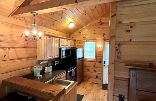 Vesta Cabina | River Walk Cabins: Fishing Cabin