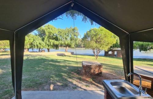 Christiana Otro | Riverbend Camp - Self-catering Luxury Glamping Tent
