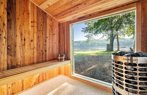 Waterford Cabina | Riverfront Cabin with Heated Pool, Cedar Hot Tub, Sauna and Dock