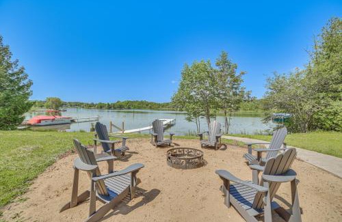 Cheboygan Casa | Riverfront Cheboygan Home with Deck and Boat Dock!