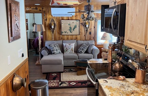 Indian River Cabaña | Riverfront Cottage w/ Boat Docking and easy access to Burt Lake