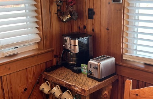 Indian River Cabaña | Riverfront Cottage w/ Boat Docking and easy access to Burt Lake