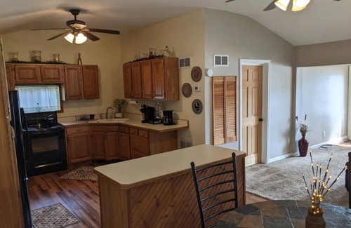 Colton Cabaña | Riverfront Cottage with Hot Tub, Kayaks, Canoes, & Fishing Boats!
