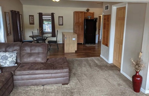 Colton Cabaña | Riverfront Cottage with Hot Tub, Kayaks, Canoes, & Fishing Boats!