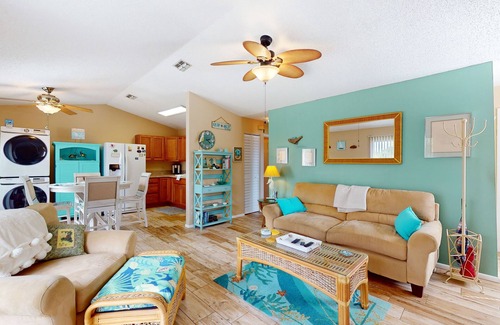 El Jobean Casa | River view home with pool, game tables, playground, scenic balcony, & W/D