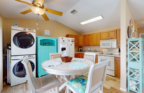 El Jobean Casa | River view home with pool, game tables, playground, scenic balcony, & W/D