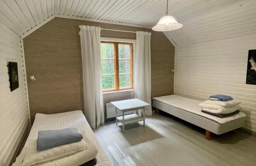 Mikkeli Apartamento | Riverfront Retreat Willa Taimen with wooden sauna & wild nature