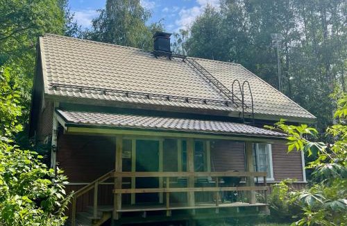Mikkeli Apartamento | Riverfront Retreat Willa Taimen with wooden sauna & wild nature