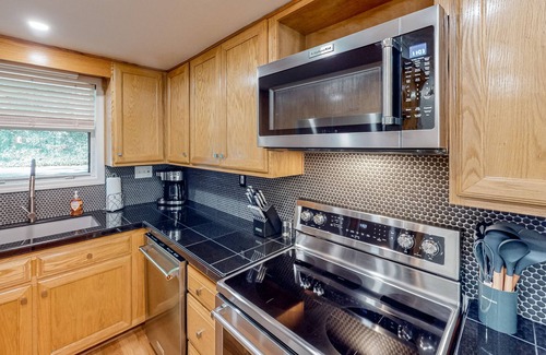East Ellijay Casa | Riverfront townhome with two decks, fireplace, gazebo & woodland views