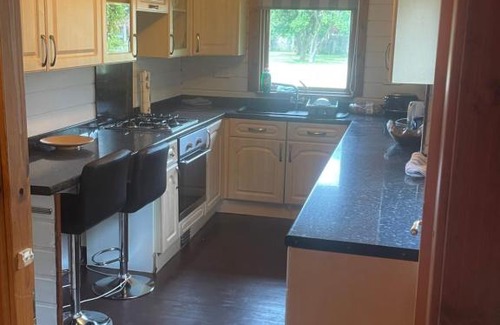 Skegness Casa | Riverside Log Cabin 3 bedrooms sleeps 6