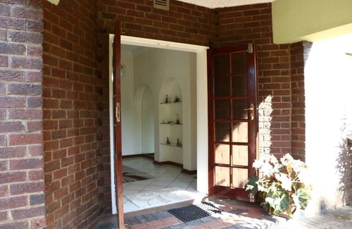 Harare East Casa | El jardín de Riverton