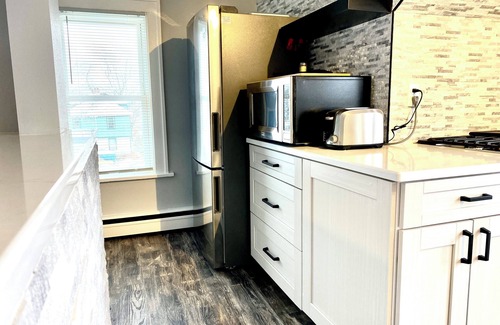 Rockford Casa | Rockford 2BD w/ EV Charger, Patio & Fast WiFi, Upscale Furnished Rentals in Rockford, IL | Ideal Sho