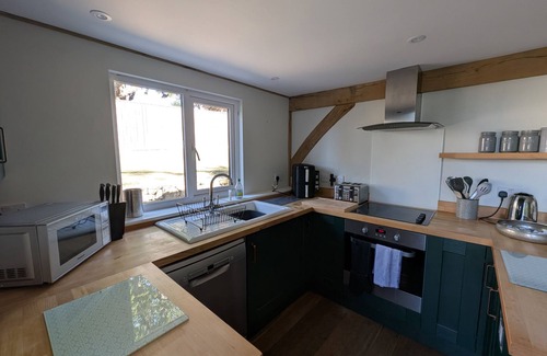 Holworth Cabaña | ROMAN LODGE, pet friendly, with a garden in Osmington