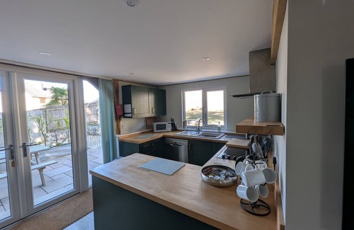 Holworth Cabaña | ROMAN LODGE, pet friendly, with a garden in Osmington
