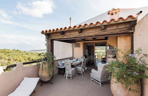 Porto Pozzo Apartamento | Apartamento romántico con vistas al mar en el archipiélago de la Maddalena.