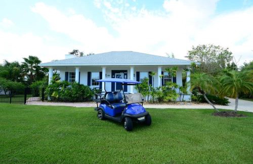Palm Coast Casa | Romantic Beach Home with Heated Pool Golf Cart