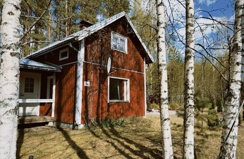 Kesaelahti Cabaña | Romantic Forest Cottage near Lake Sauna, Firepit & Cozy Scandinavian Design