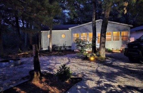 Bitely Cabaña | Romantic woodland cottage vacation rental in Baldwin. Pet friendly!