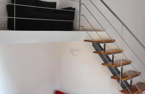Rione XVIII Castro Pretorio Apartamento | Rome: Sleeping space and living room - two levels between Repubbli