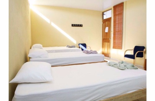 Managua Cama Y Desayuno | HABITACION 1-C - 3 CAMAS INDIVIDUALES