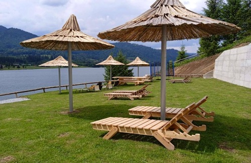 Colibita Apartamento | Room at lake Colibita with an incredible view over the lake with Jacuzzi.