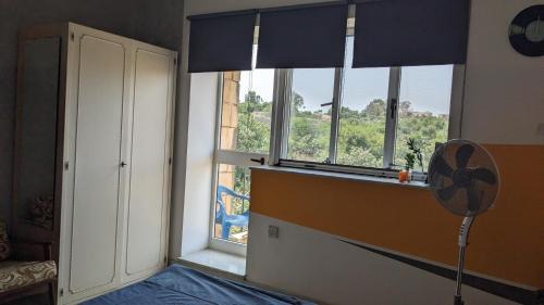 San Gwann Casa | Room in a spacious modernist Apt with views & pool