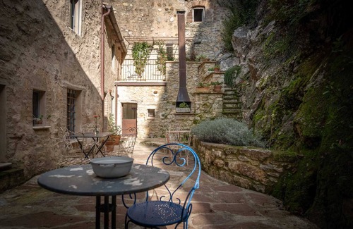 Campiglia d'Orcia Apartamento | Habitación 'L'imbrunire - Il Lampadone' con jardín compartido, Wi-Fi y aire acondicionado.
