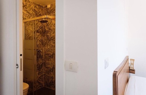 Porto Torres Apartamento | Habitación Mirto - Habitación full service con baño privado