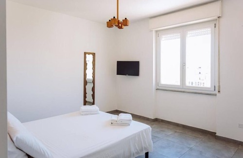 Porto Torres Apartamento | Room Olivo - Full service room with private bathroom