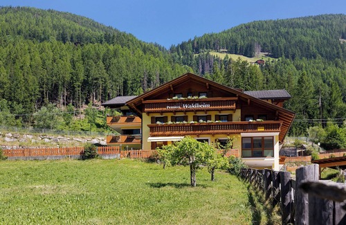 Valle Aurina Apartamento | Habitación 'Pension Waldheim 11' con vistas a la montaña, jardín compartido y Wi-Fi