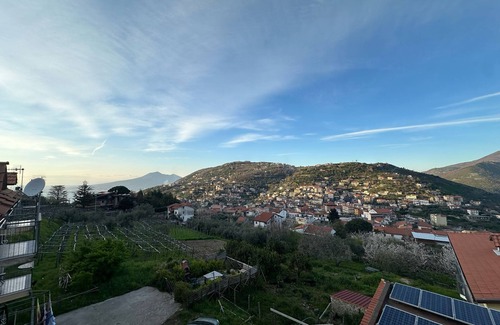 Piazza-Tralia-Pendolo Apartamento | Habitación 'Pompei Con Vista Vesuvio' con vistas a la montaña, Wi-Fi y aire acondicionado.