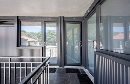 Rossas Apartamento | Habitación 'Quarto 6' con vistas a la montaña, Wi-Fi y aire acondicionado.