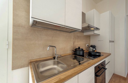 Cavallino Apartamento | Habitación 'San Giorgio Rooms 1' con terraza compartida, Wi-Fi y aire acondicionado.