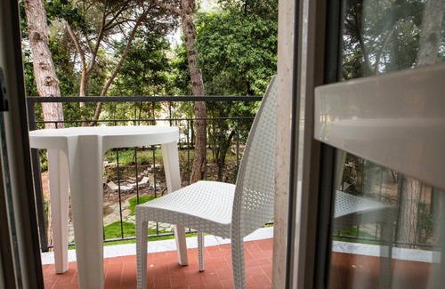Ronchi Apartamento | Habitación 'Stanza Doppia' con jardín compartido, Wi-Fi y aire acondicionado.