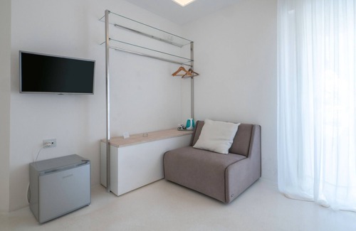 Porto Cesareo Apartamento | Habitación 'Valentino - 03' con terraza compartida, Wi-Fi y aire acondicionado