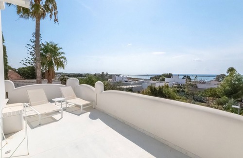 Porto Cesareo Apartamento | Habitación 'Valentino Luxury - 01' con vista al mar, Wi-Fi y aire acondicionado