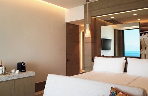 Punta Sam Hotel | Room w/ Balcony facing the Sea in Tranquil Beachfront Resort w/ Outdoor Pools