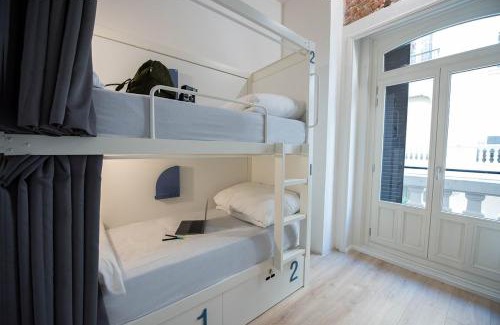 Justicia Hostal | room00 Gran Vía Hostel