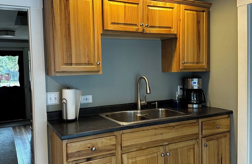 Sebago Casa | Roomy 3 bedroom with fireplace & wood-burning stove steps away from Sebago Lake