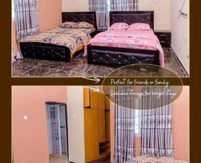 Benin City Apartamento | Royal Guests Holiday Lets - A Modern 2-Bedroom Apartment with balcony, 24H CCTV, perfect for families, business or leisure