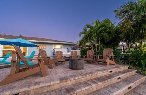 Whitney Beach Casa | Royal Palm Paradise! Waterfront, Private Pool & Hot Tub, Boat Dock!